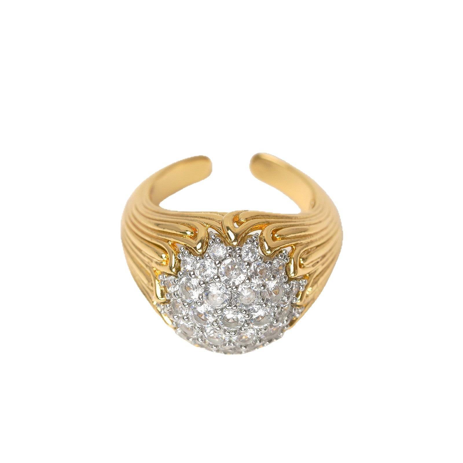 Full view of the navette-shaped gold cluster ring by Ever P., reflecting Old World luxury.