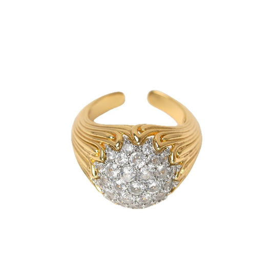 Full view of the navette-shaped gold cluster ring by Ever P., reflecting Old World luxury.