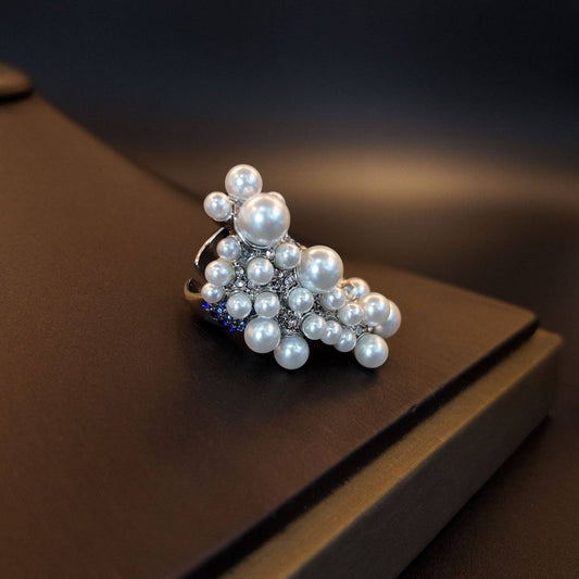 High-angle shot of the statement ring, highlighting the asymmetric 5x3cm dramatic seafoam shape.