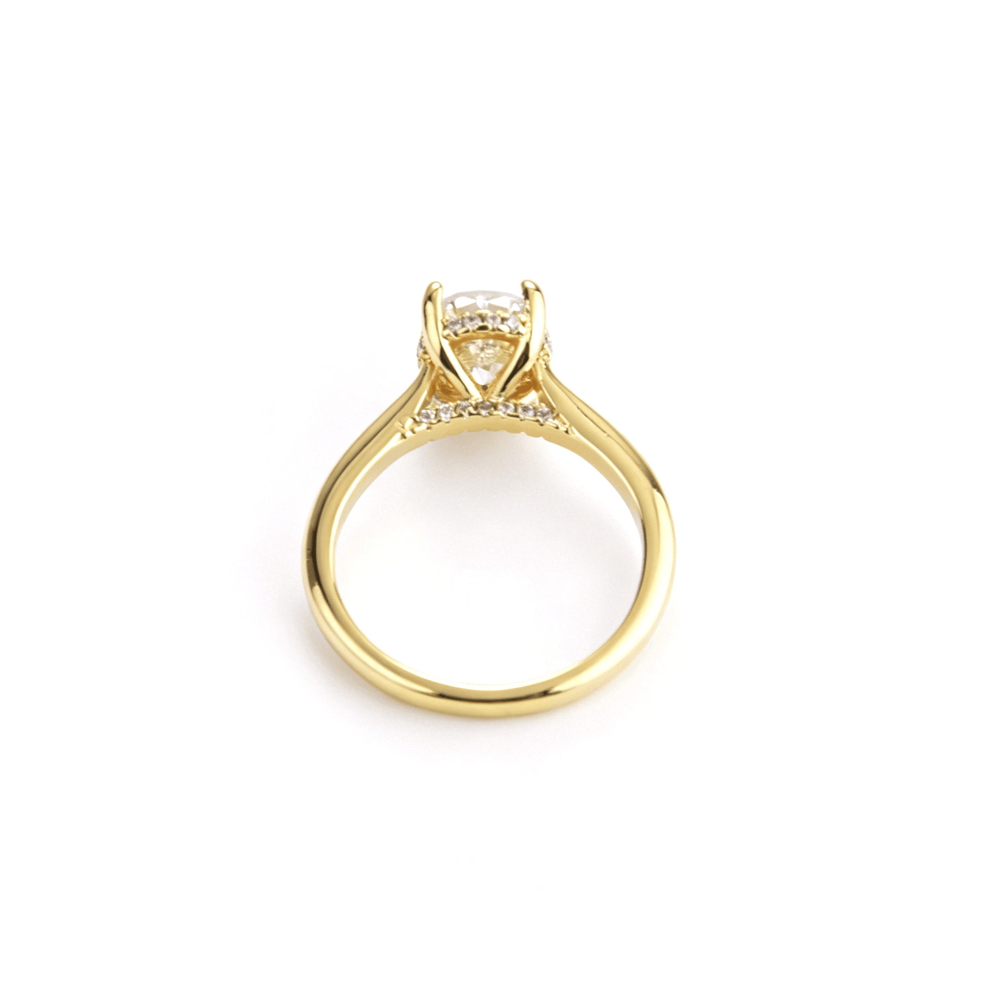 Front view of Ever P. oval solitaire engagement ring featuring a 5A cubic zirconia stone on a 14K gold band.