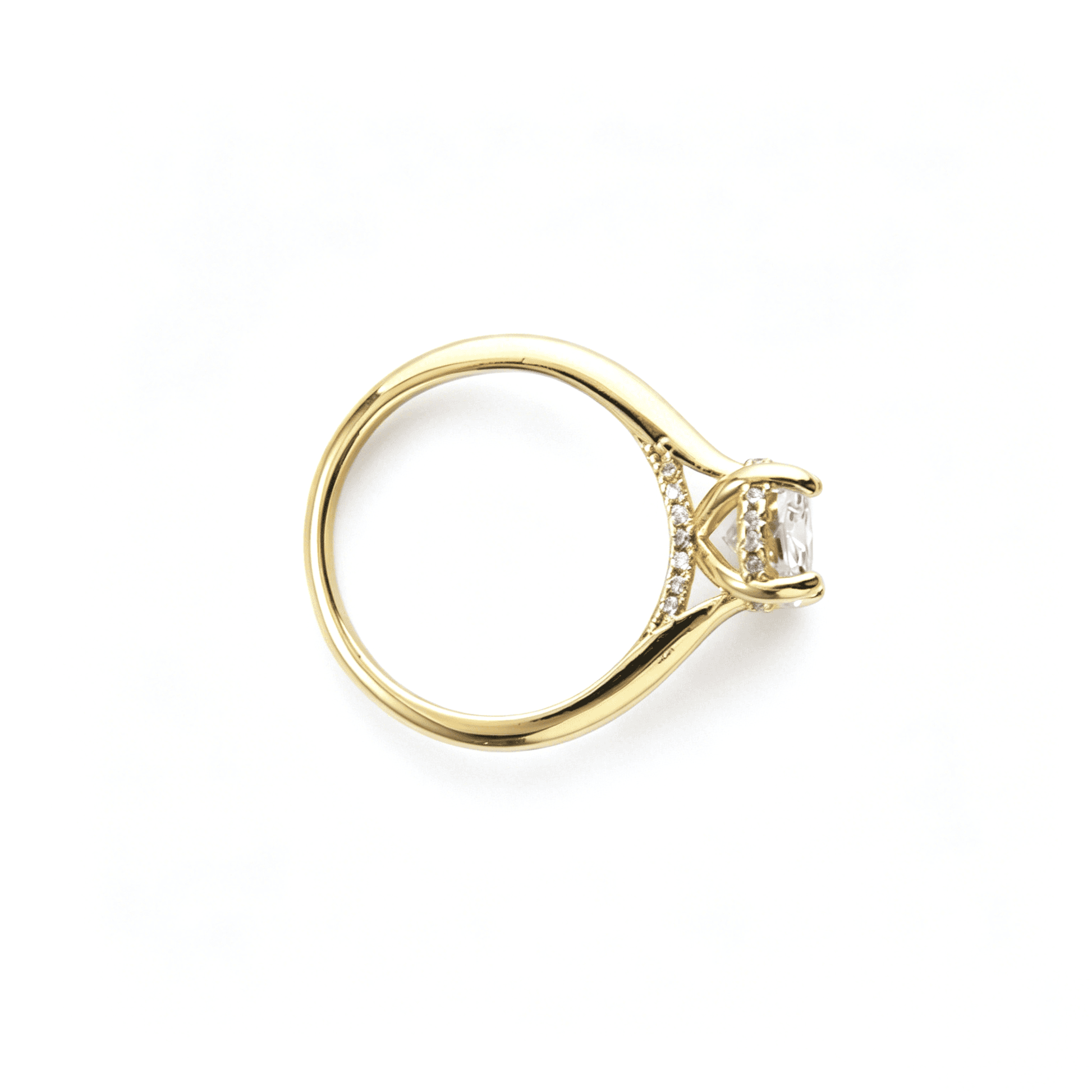 Detailed finger-wearing lifestyle shot of the classic oval ring styled as a gold engagement ring for women.