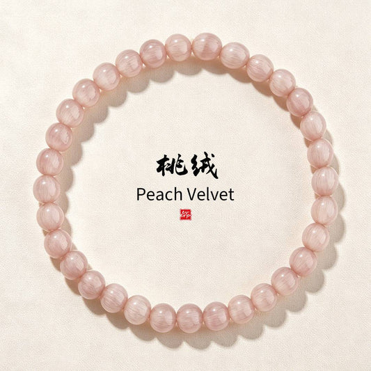 "Peach Velvet" (桃绒) collection cover featuring the crimson handmade agate bracelet.