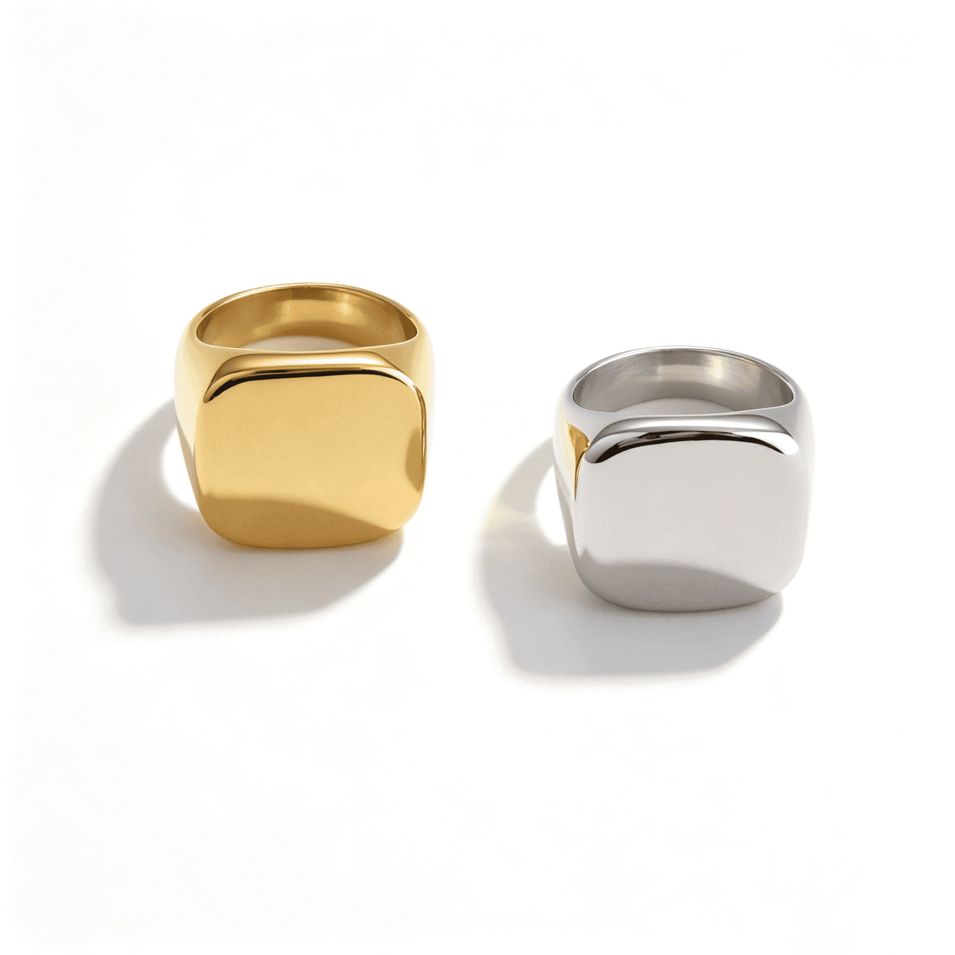 Detail of the Ever P. premium 18k gold plated stainless steel rings with a substantial 20x20mm signet area.
