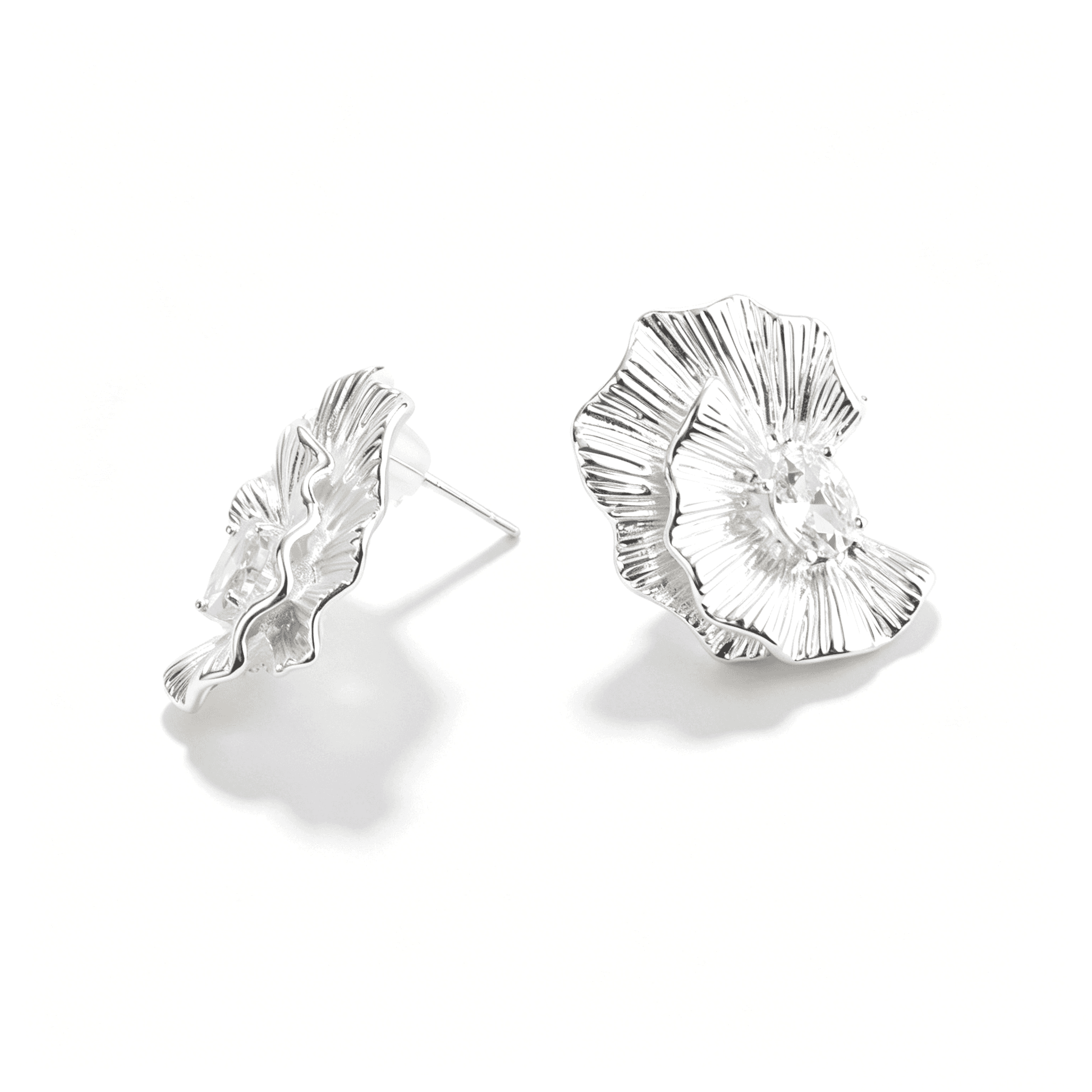 Ever P. silver flower earrings featuring a bold tubular petal design and high-polish finish.