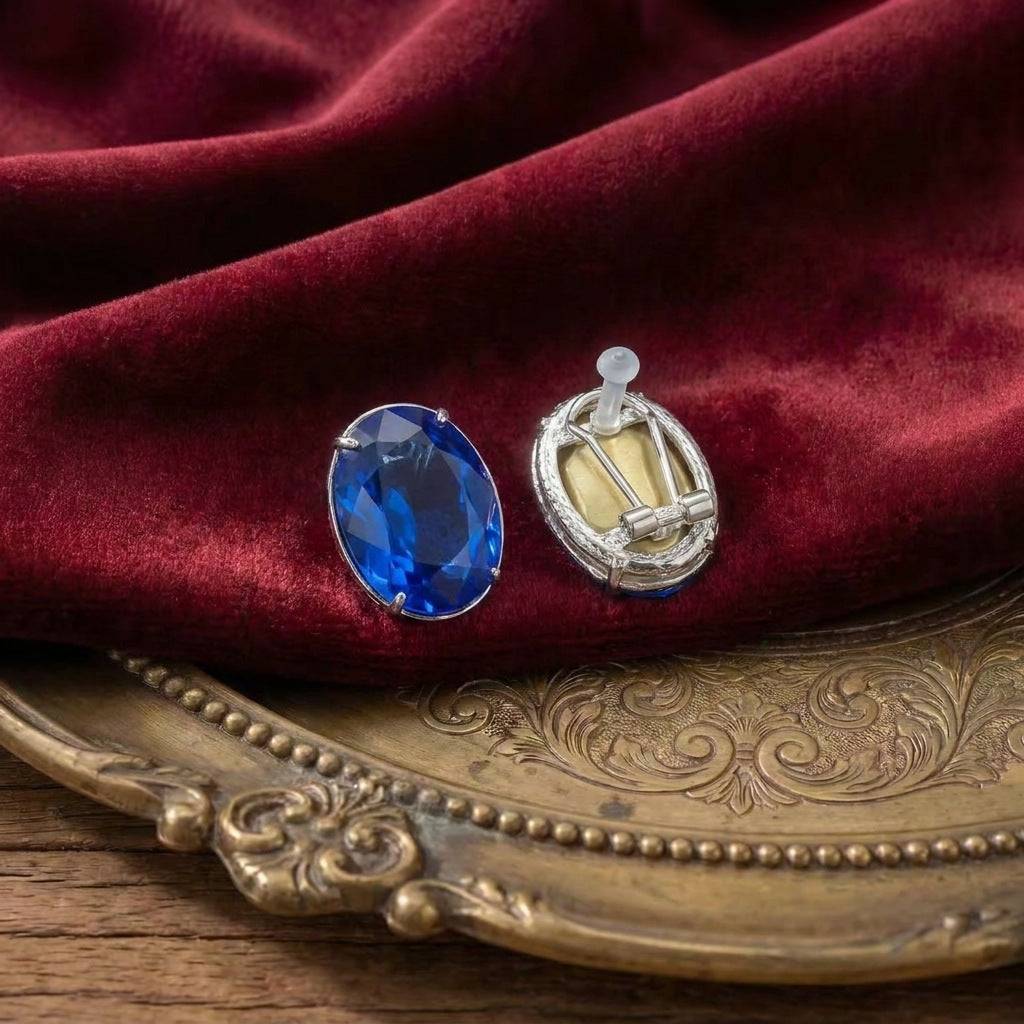 Lifestyle-focused view of the socialite style blue and gold earrings.