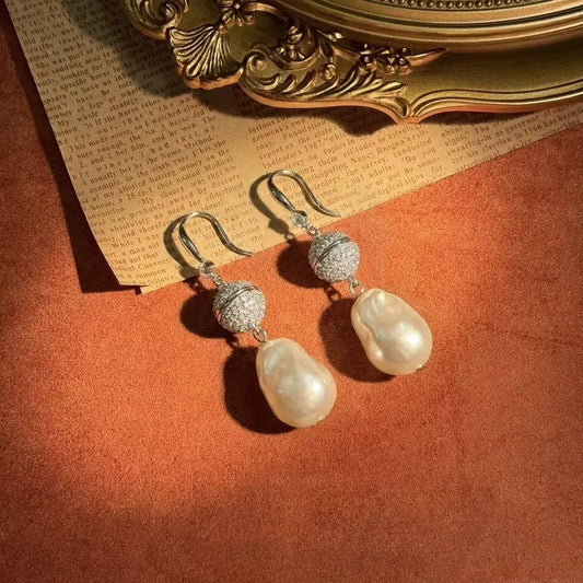 Detailed view of the organic texture on Ever P. statement pearl earrings with a vintage aesthetic.