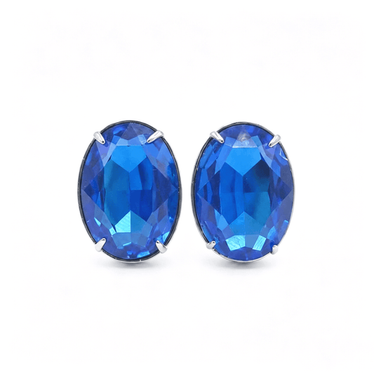 Pair of vintage-inspired blue stud earrings with a sparkling rhinestone halo.