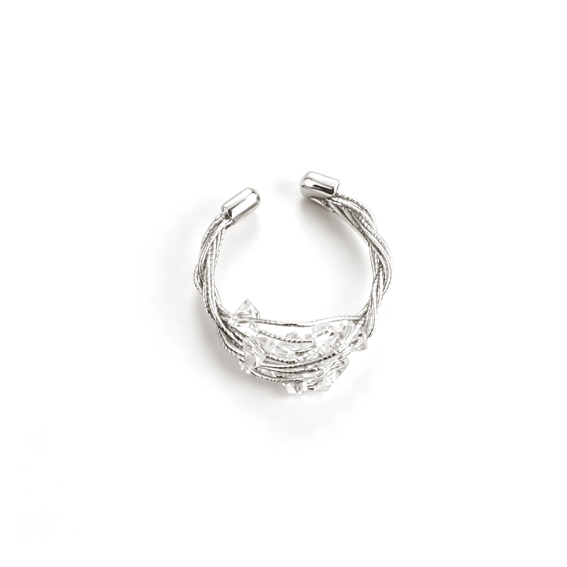 Detailed perspective of the sculptural 18K gold plated open ring band showcasing its layered metallic lines.