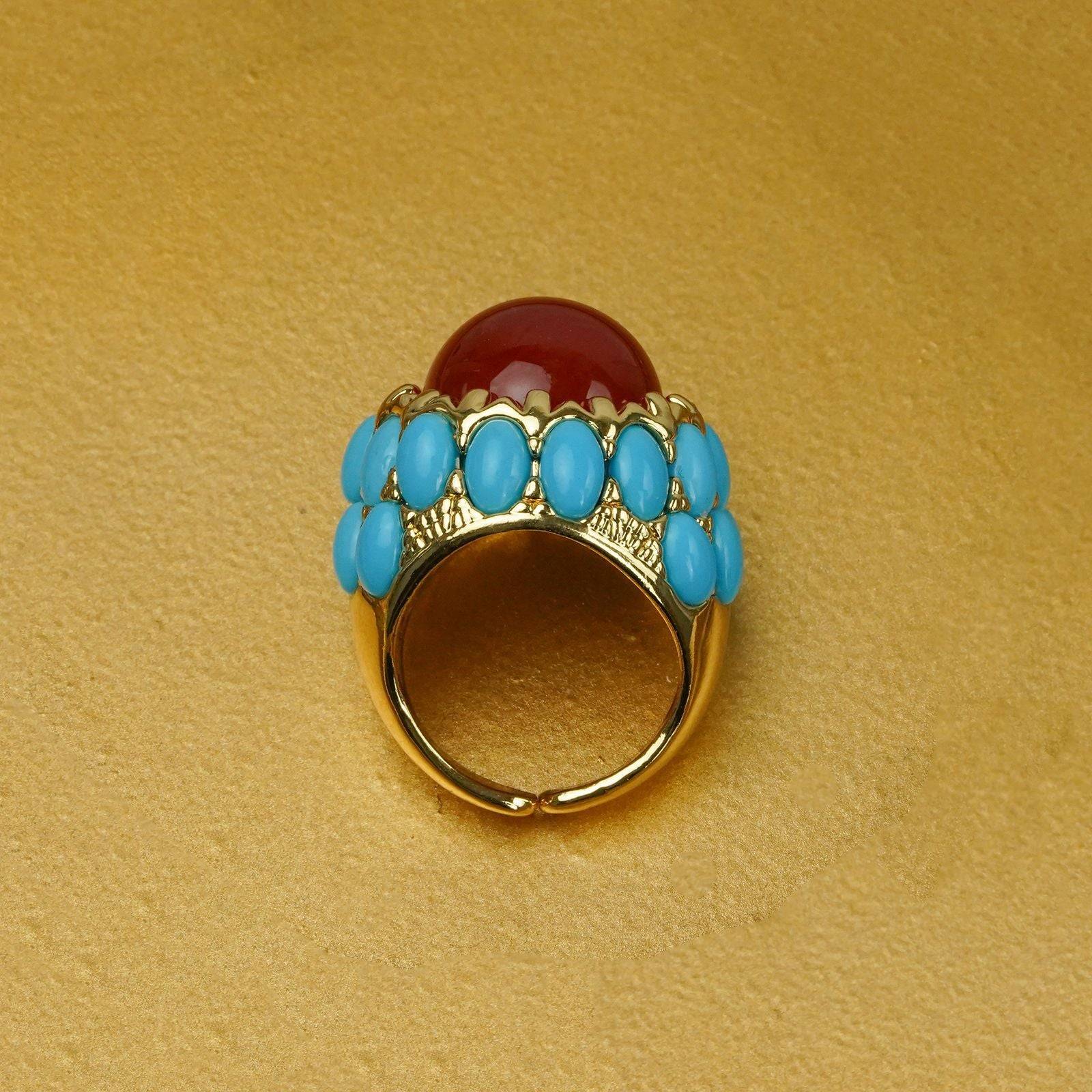 Detailed perspective highlighting the tribal engravings on the chunky rings band and the secure adjustable open back.