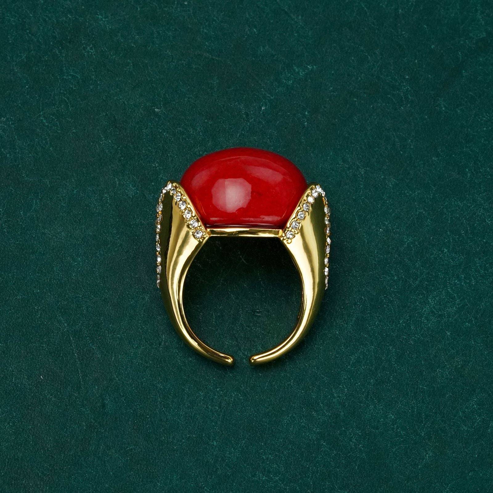 Studio portrait showcasing the ethereal cat's eye glow of the oval engagement rings alternative.