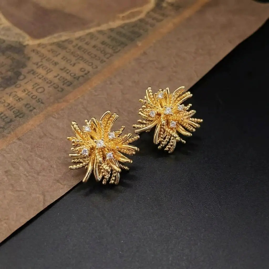 Side perspective showing the hollow-out geometric structure of the vintage firework studs.