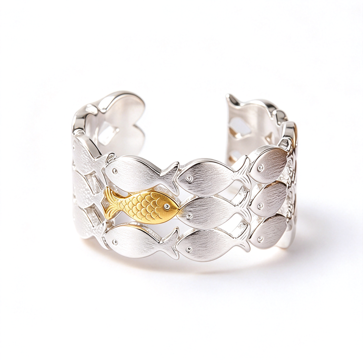 Fish school adjustable open ring featuring textured silver-tone fish and a contrasting gold-tone fish accent