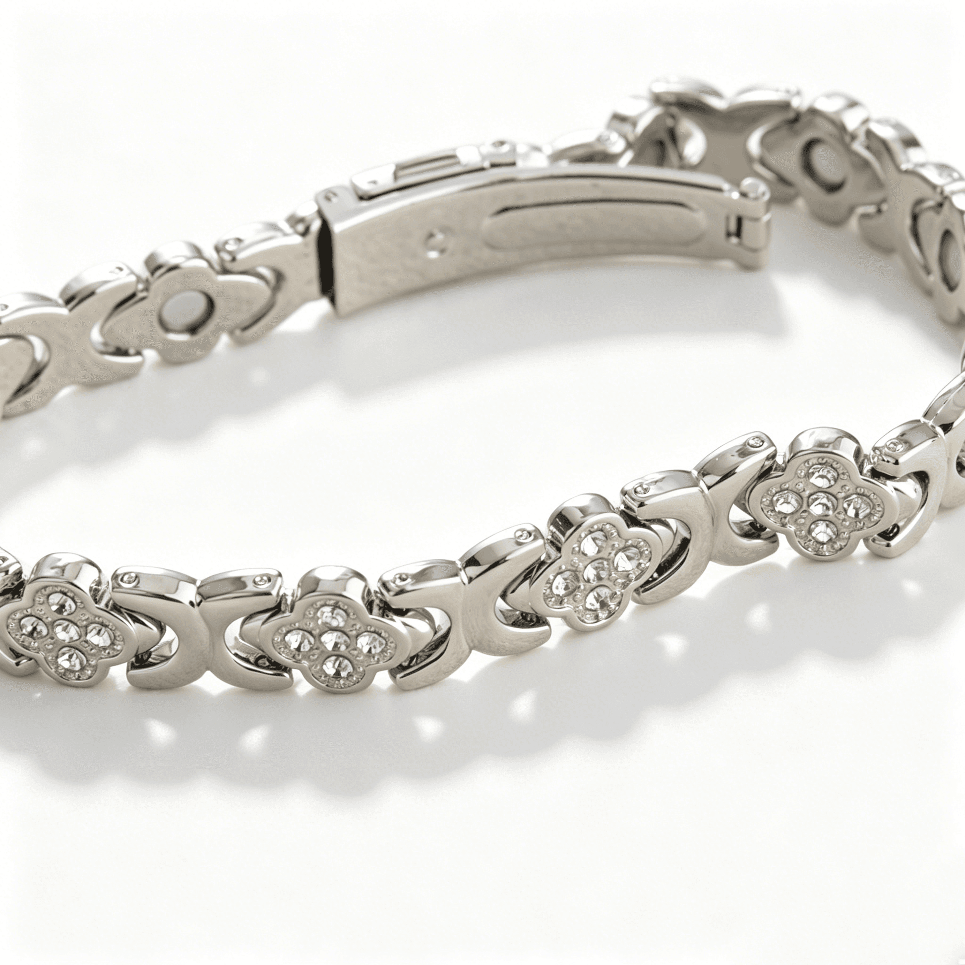 Comparison display of the four leaf clover bracelet available in both rose gold and silver tones with crystal accents.