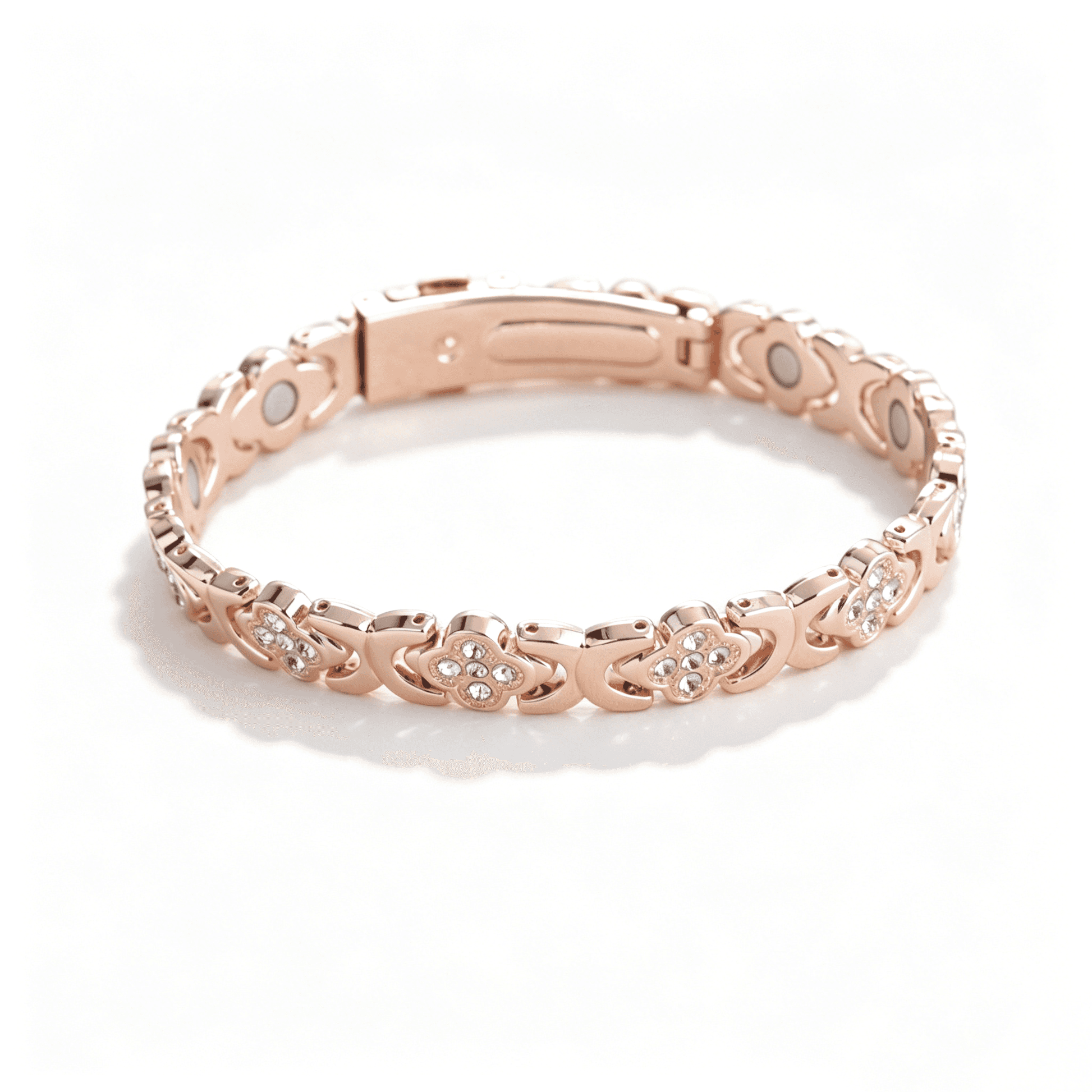 A rose gold four leaf clover bracelet featuring four interconnected hearts adorned with sparkling pave crystals.