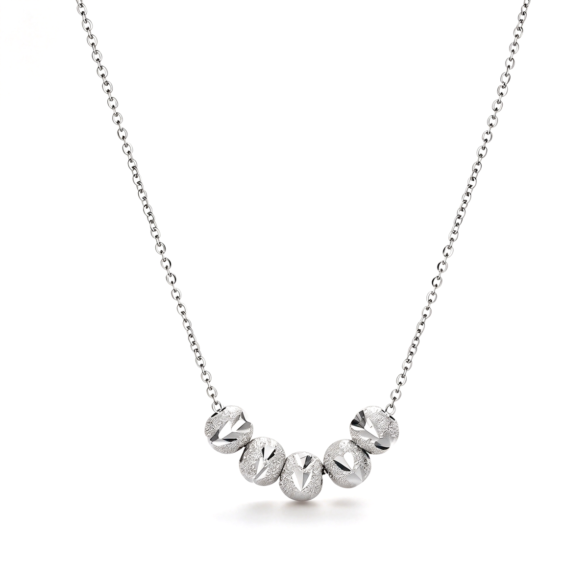 Geometric bead necklace with five rounded decorative beads shown against a white background.