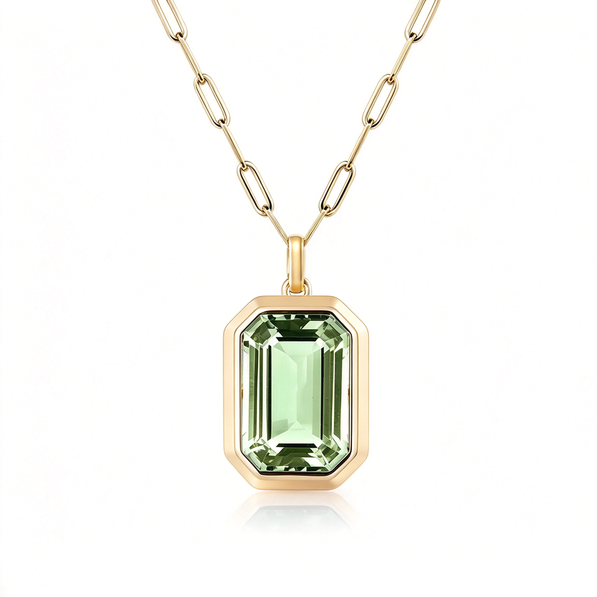 Green rectangular pendant necklace shown with its linked chain on white.