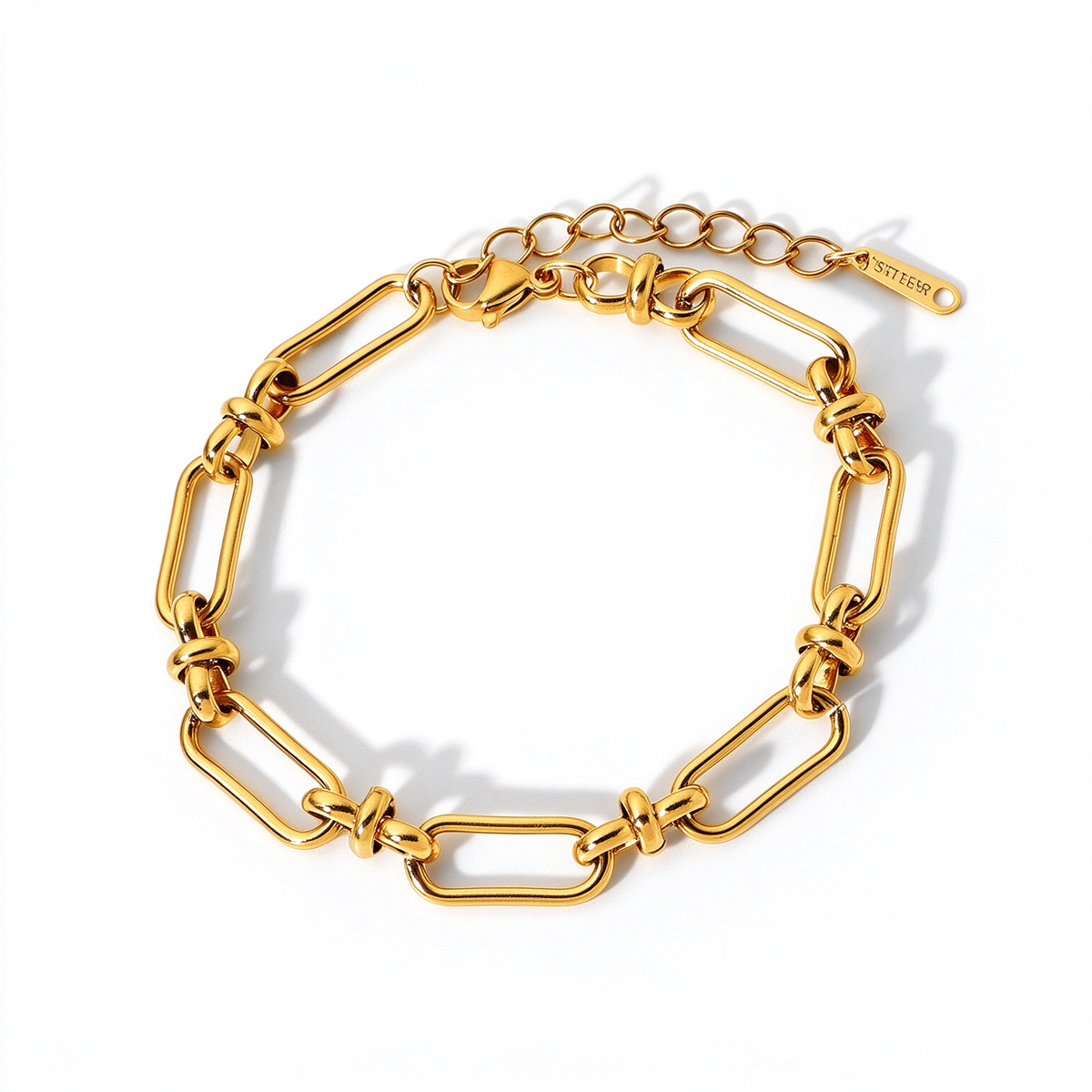Gold-tone geometric link chain bracelet arranged in a circle on a white background