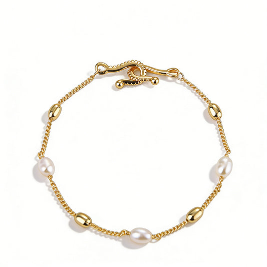 18k gold plated statement bracelet featuring bold geometric circular and rectangular links.