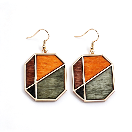 Geometric multicolor dangle earrings with octagonal panels in orange, brown, and muted green.