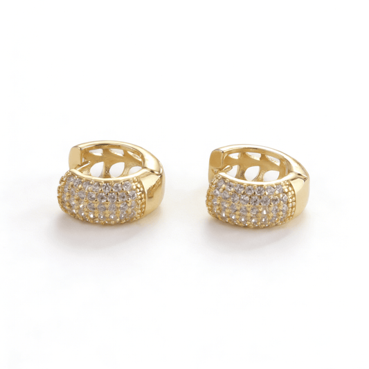 A pair of 18k gold plated huggie hoop earrings with premium micro-pave cubic zirconia stones for a radiant shimmer.