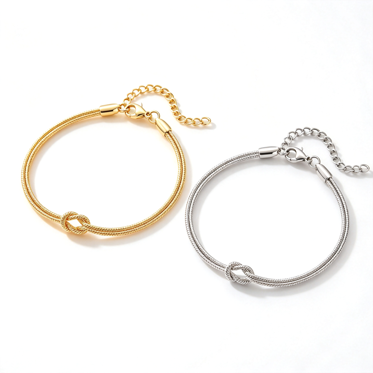 Matching gold-tone and silver-tone love knot bracelets displayed together on a white background.