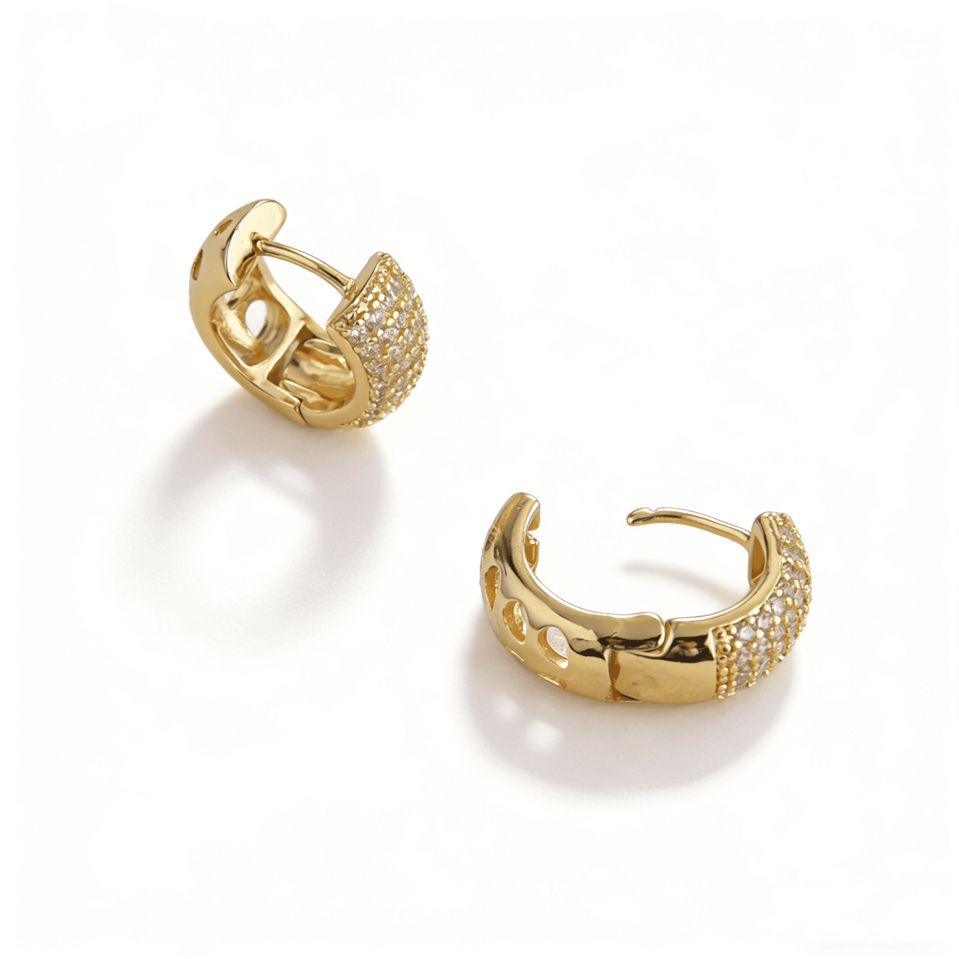 Close-up of gold small hoop earrings showing the secure S925 sterling silver post, hypoallergenic for sensitive ears.