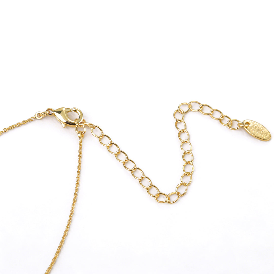 Lifestyle shot of green crystal beaded necklaces, highlighting the earthy forestcore aesthetic.