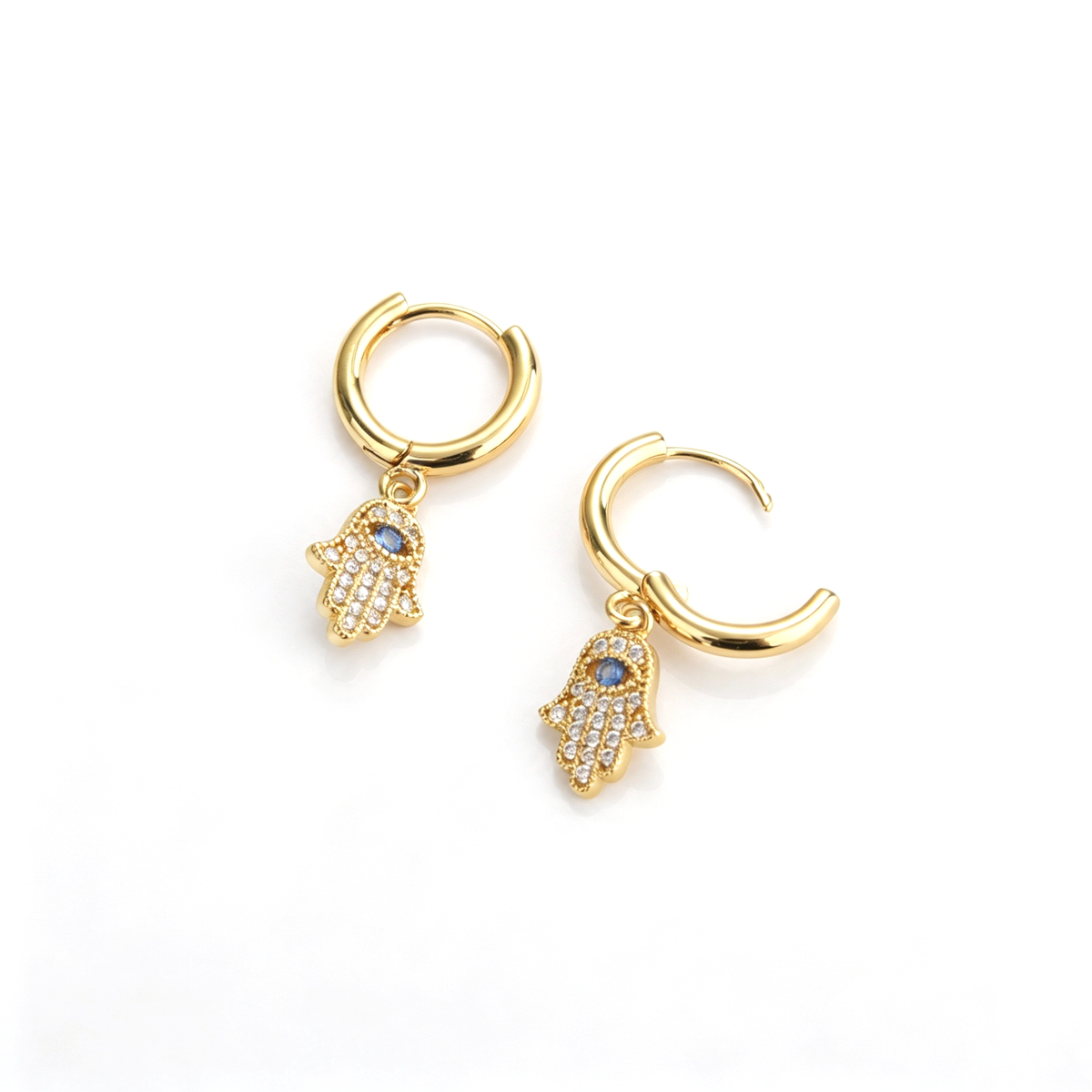 Open hoop earring view showing the hamsa hand charm and hinged hoop design