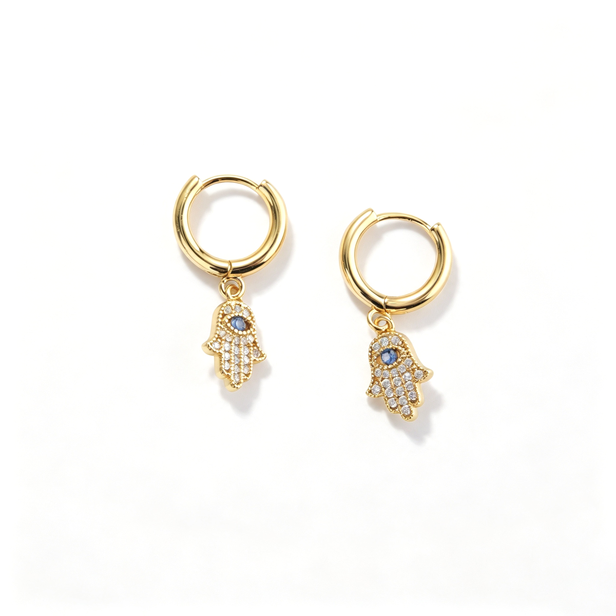 Pair of hamsa hand earrings showing matching hoop silhouettes and dangling charms