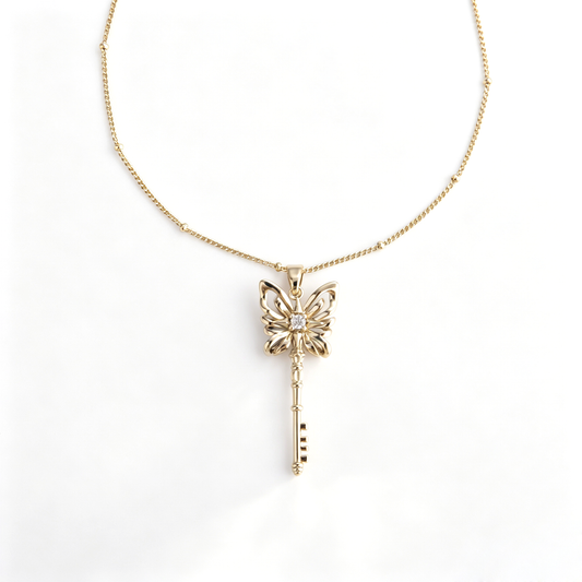 Handcrafted gold butterfly key pendant long necklace with beaded satellite chain