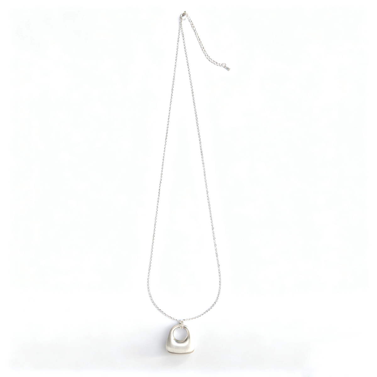 Lobster claw clasp and extension chain with teardrop charm on silver long necklace