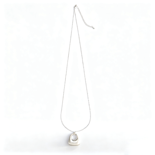 Lobster claw clasp and extension chain with teardrop charm on silver long necklace