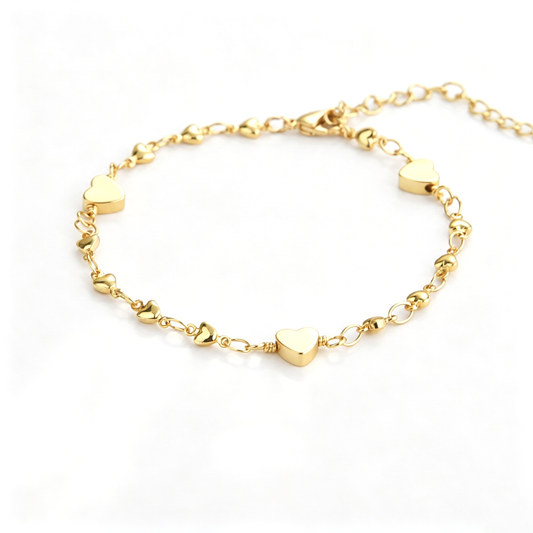 Back view of the heart charm bracelet showing the chain, clasp, and extension