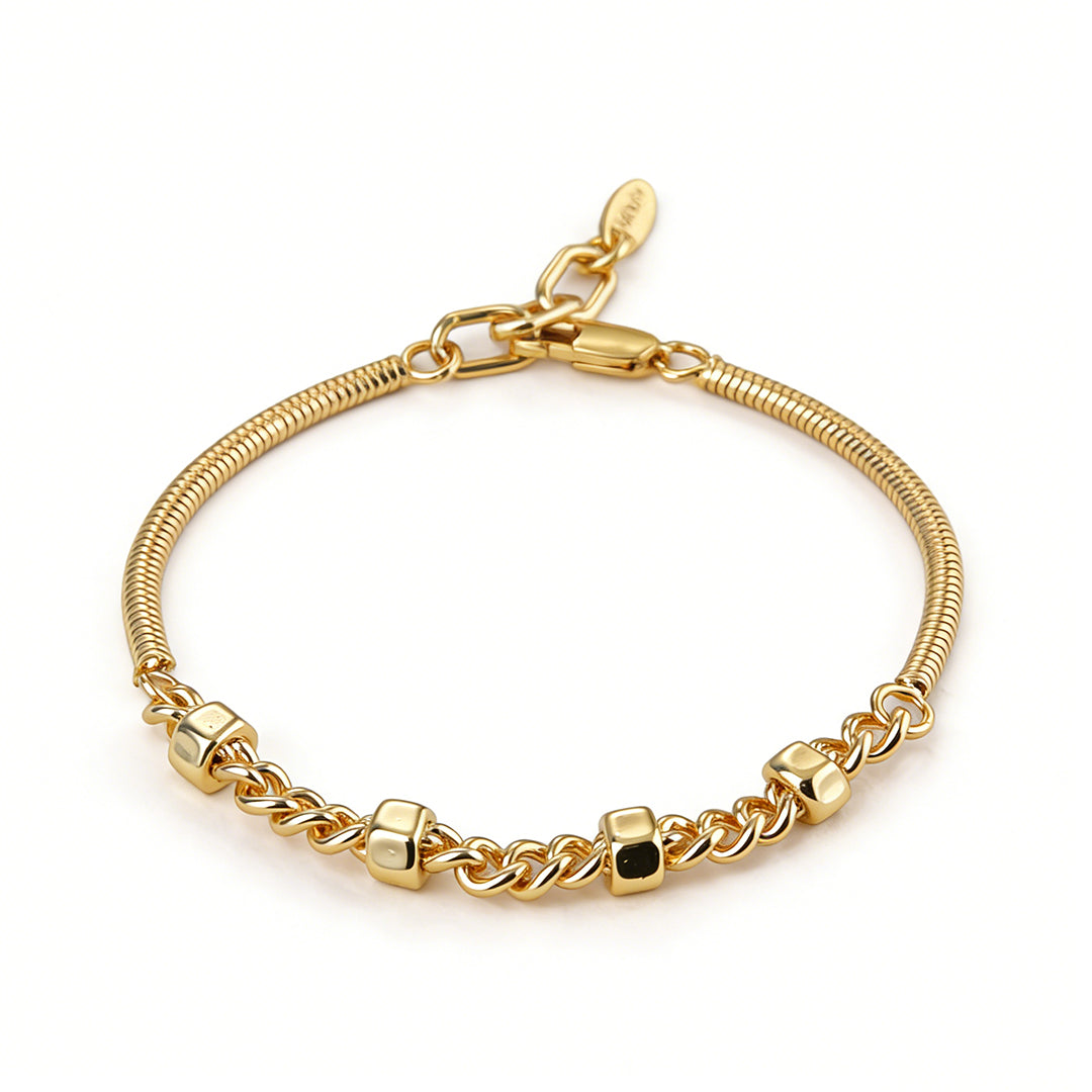 Detail view of the industrial-chic hex nut design on a radiant tarnish-resistant gold snake chain.