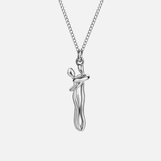 Silver-tone stainless steel hug pendant necklace shown front-facing on white background