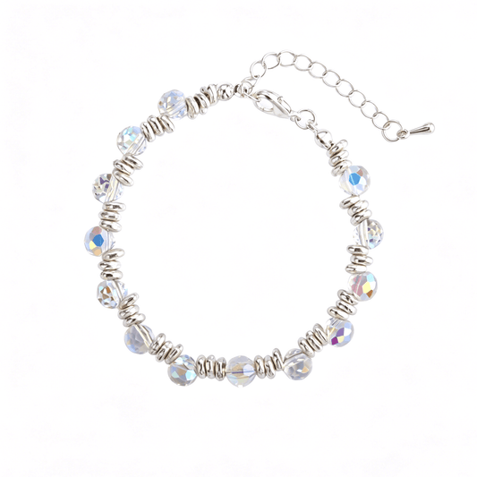 Flat lay profile of the silver-plated beaded clasp bracelet showcasing faceted iridescent AB crystal bulbs and layered metal O-ring spacers.