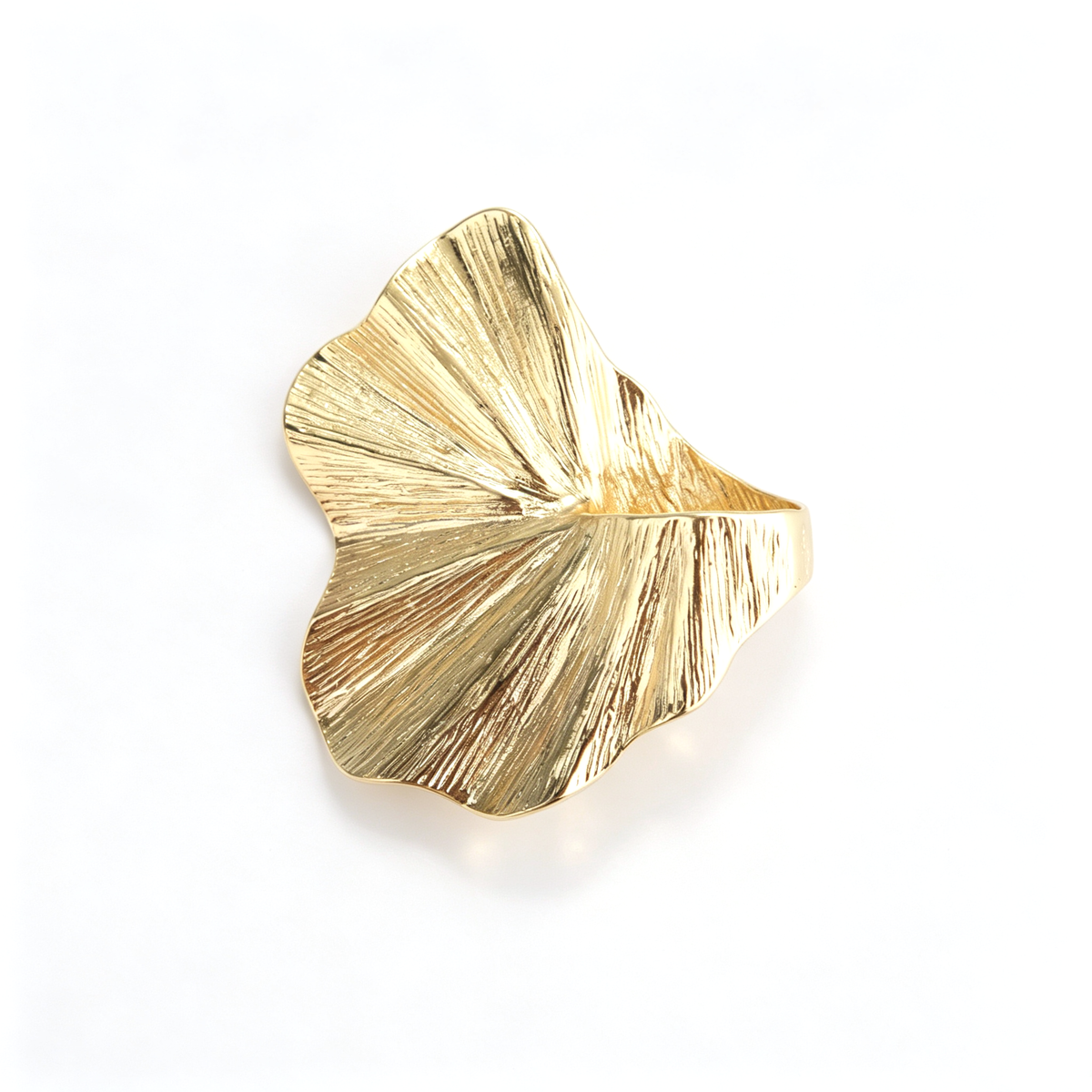 Side perspective of the silver-plated variant of the irregular pleated leaf sculptural ring.