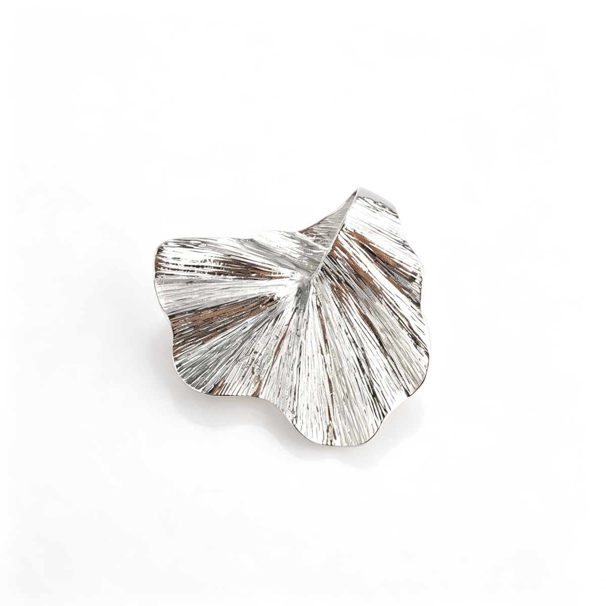 Comparison shot displaying both the gold and silver options of the ginkgo leaf statement ring.