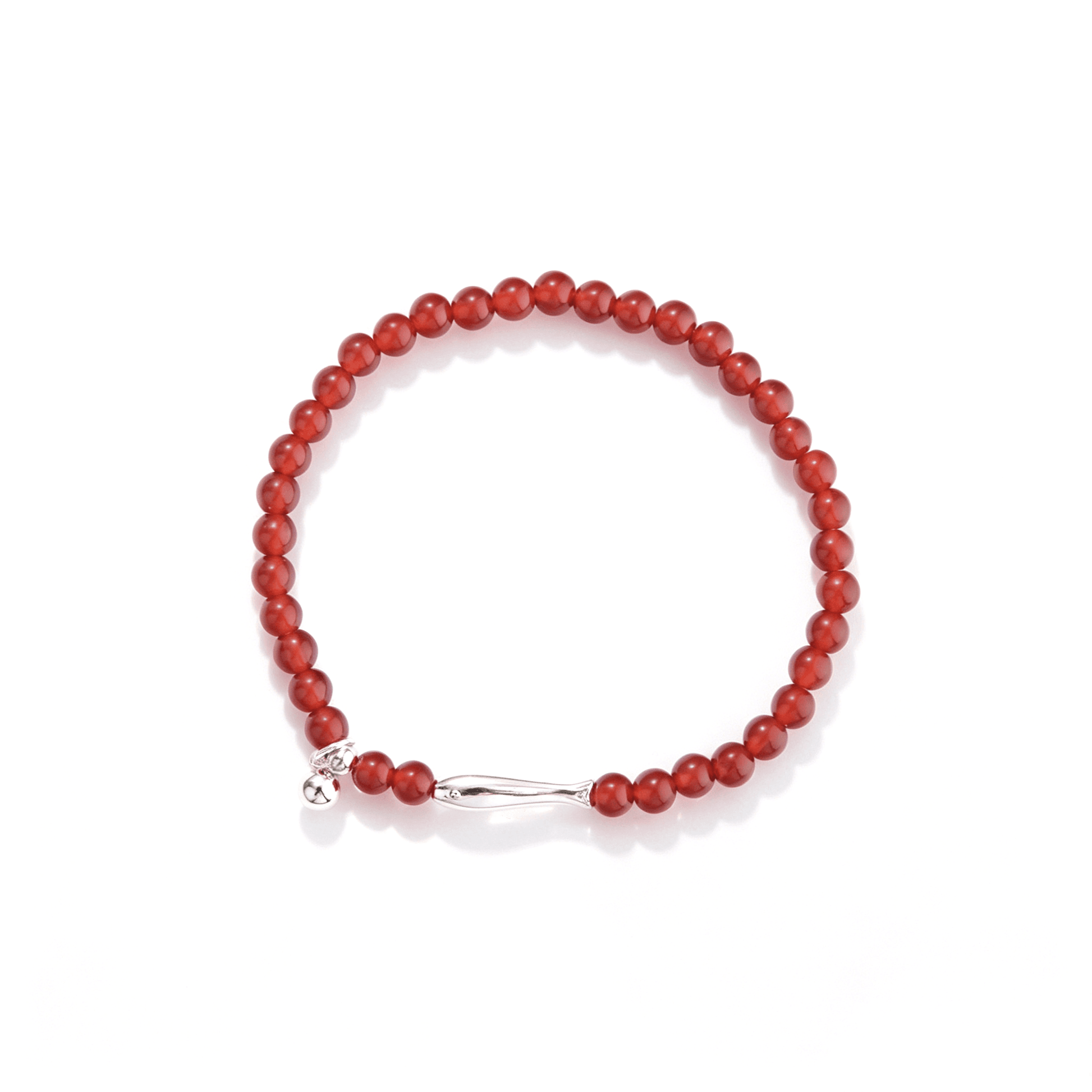 Top view of a red agate beaded stretch bracelet with a silver-tone koi centerpiece and round dangle charm.