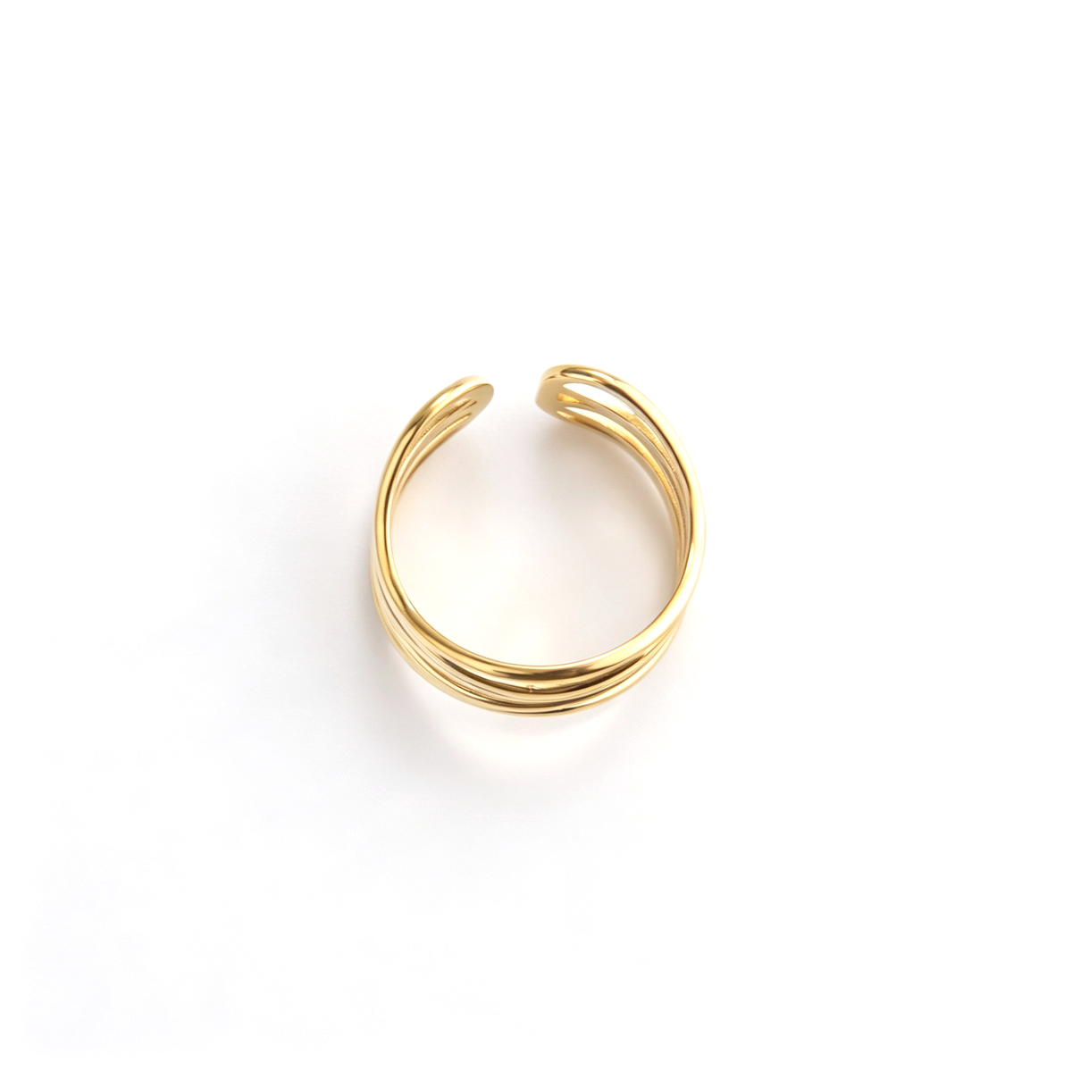 Open cuff ring shown from a three-quarter angle with multiple flowing bands