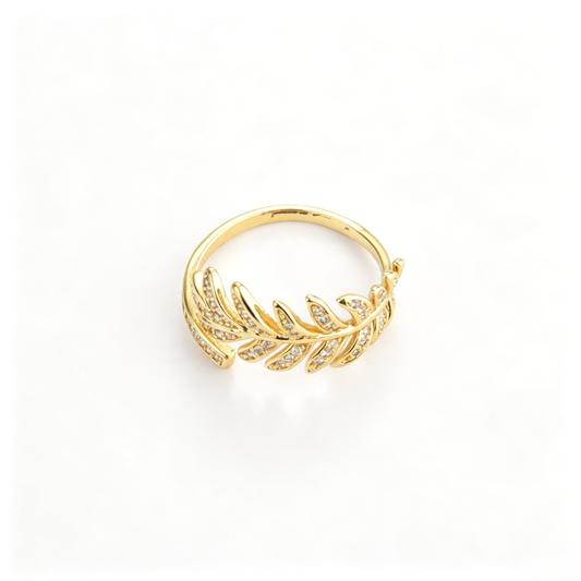 Leaf vine cuff ring with a crystal branch design in an angled view