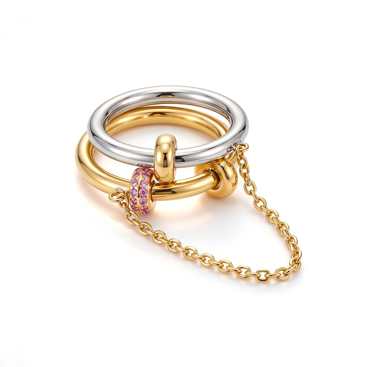 Gold and silver linked chain double ring with pink accents displayed on a white background