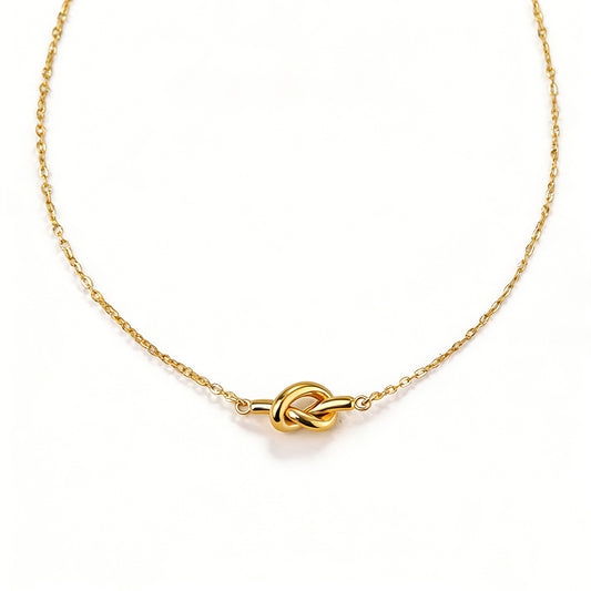 Ever P. minimalist gold necklace with a unique irregular molten pendant.