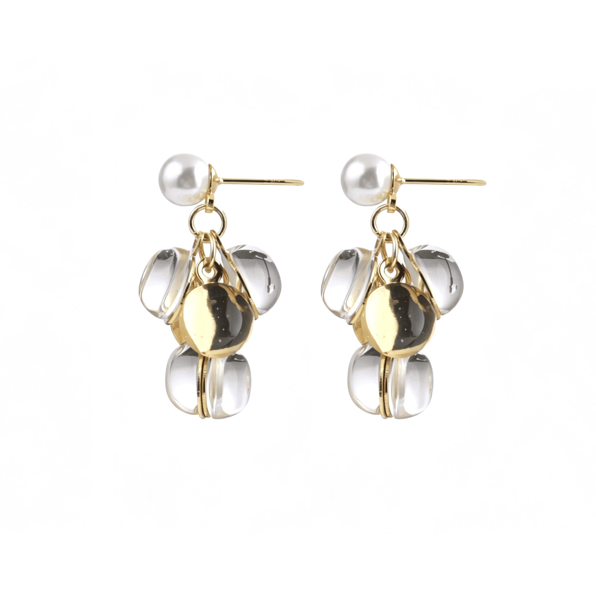 Centered front shot of the modern pearl stud drop earrings with spliced clear Lucite and reflective gold disc dangles.