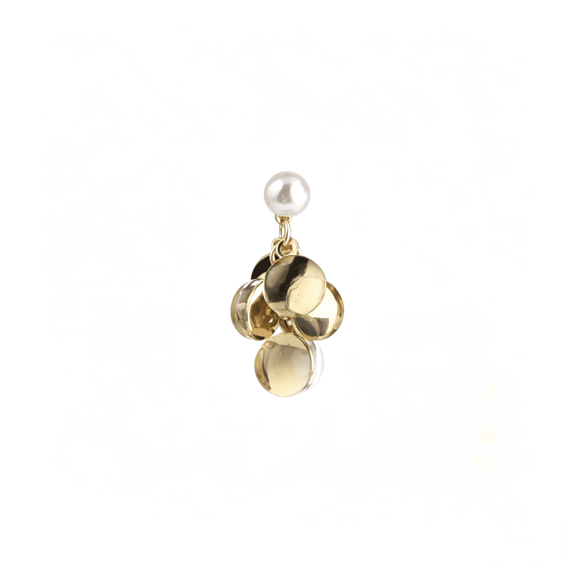 Single statement earring highlighting the seamless contrast between the white faux pearl and the light-catching Lucite gold discs.