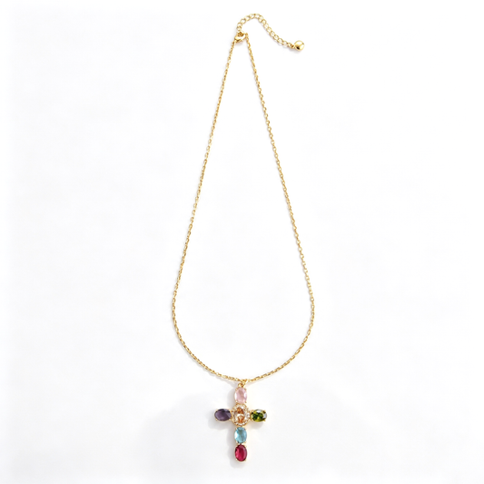 Multicolor cross pendant necklace shown in a close-up of the clasp and extension chain
