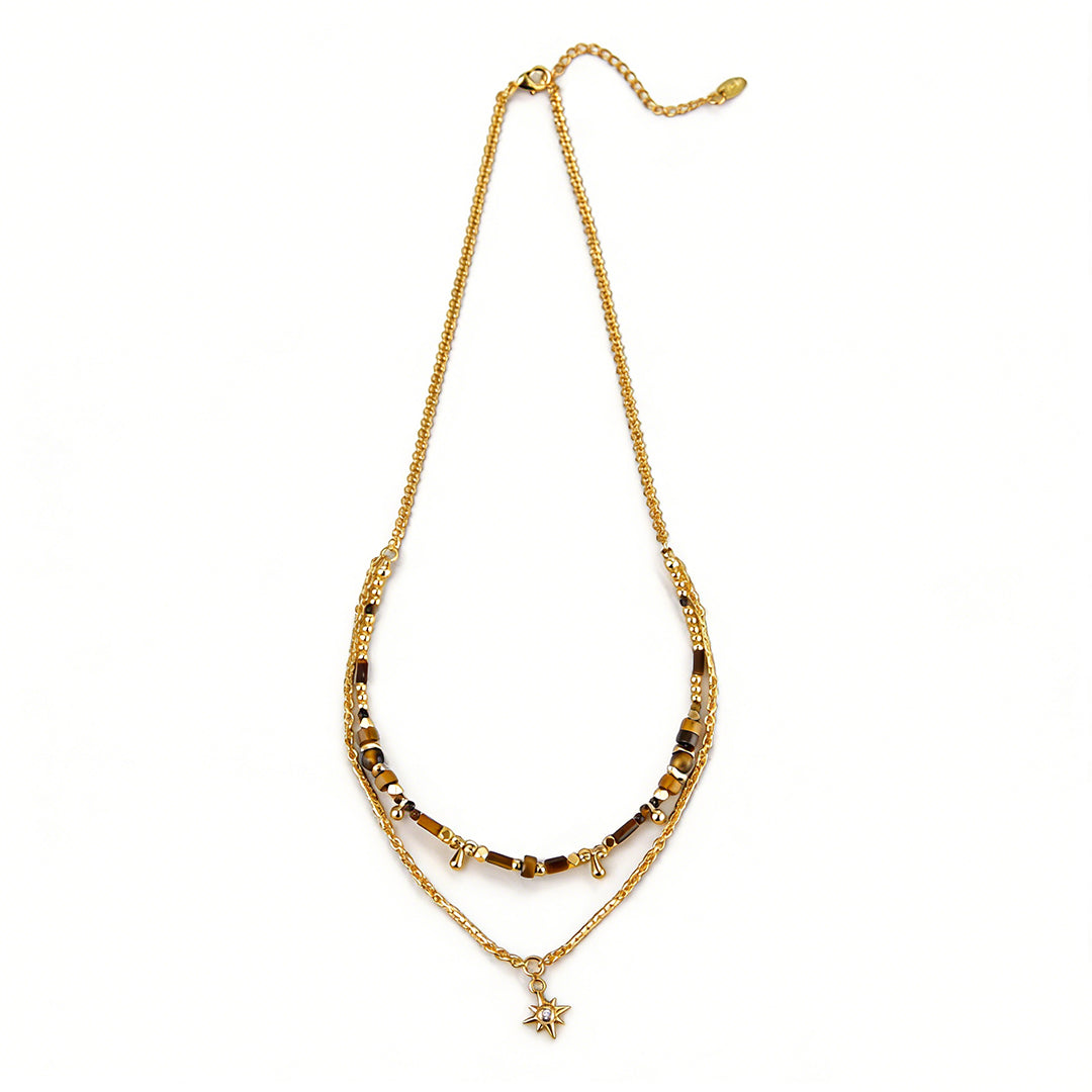 Close-up of natural stone bead necklaces showcasing the chatoyant effect of tiger eye.