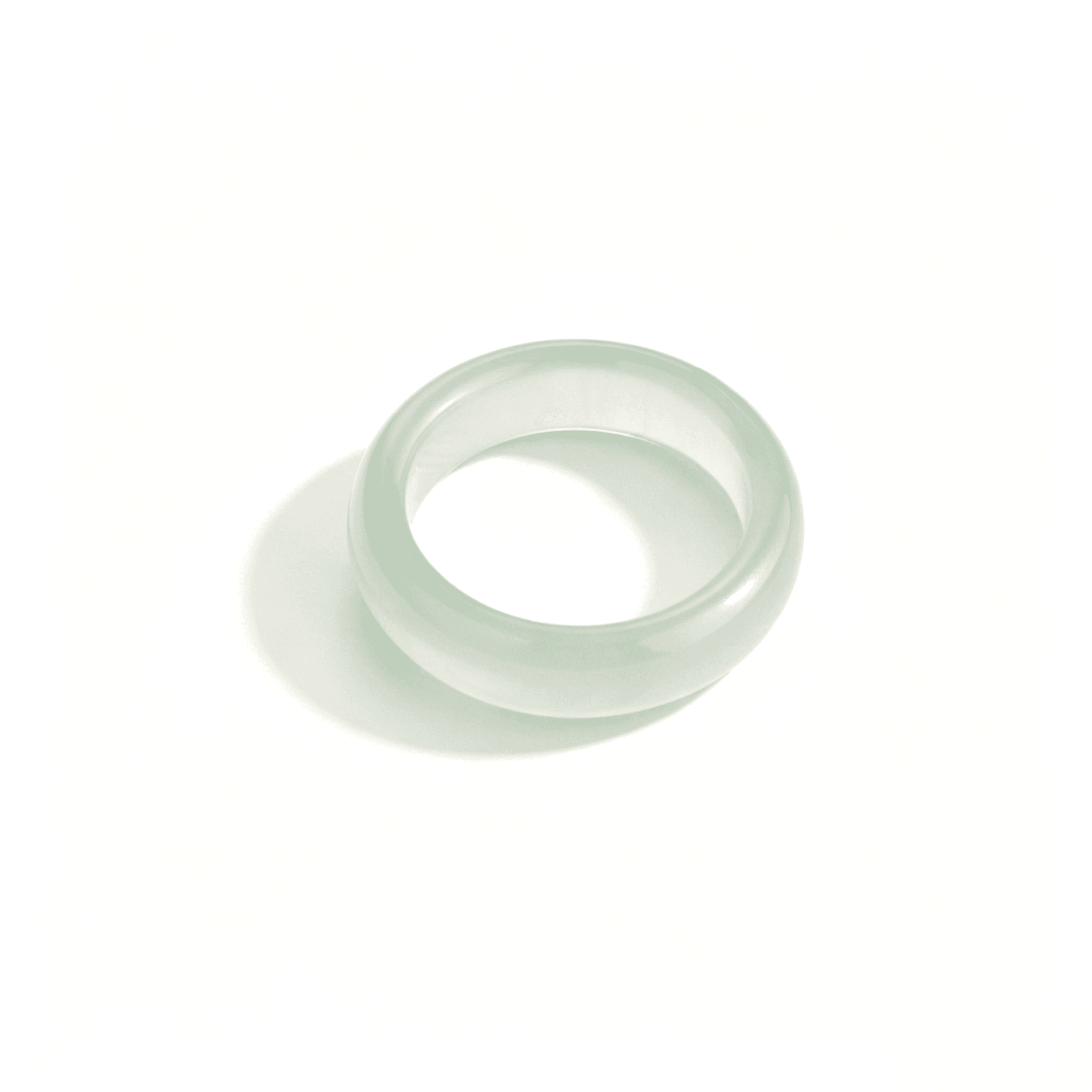 A natural oily green chalcedony ring by Ever P., featuring a deep forest green agate band with a signature waxy luster.