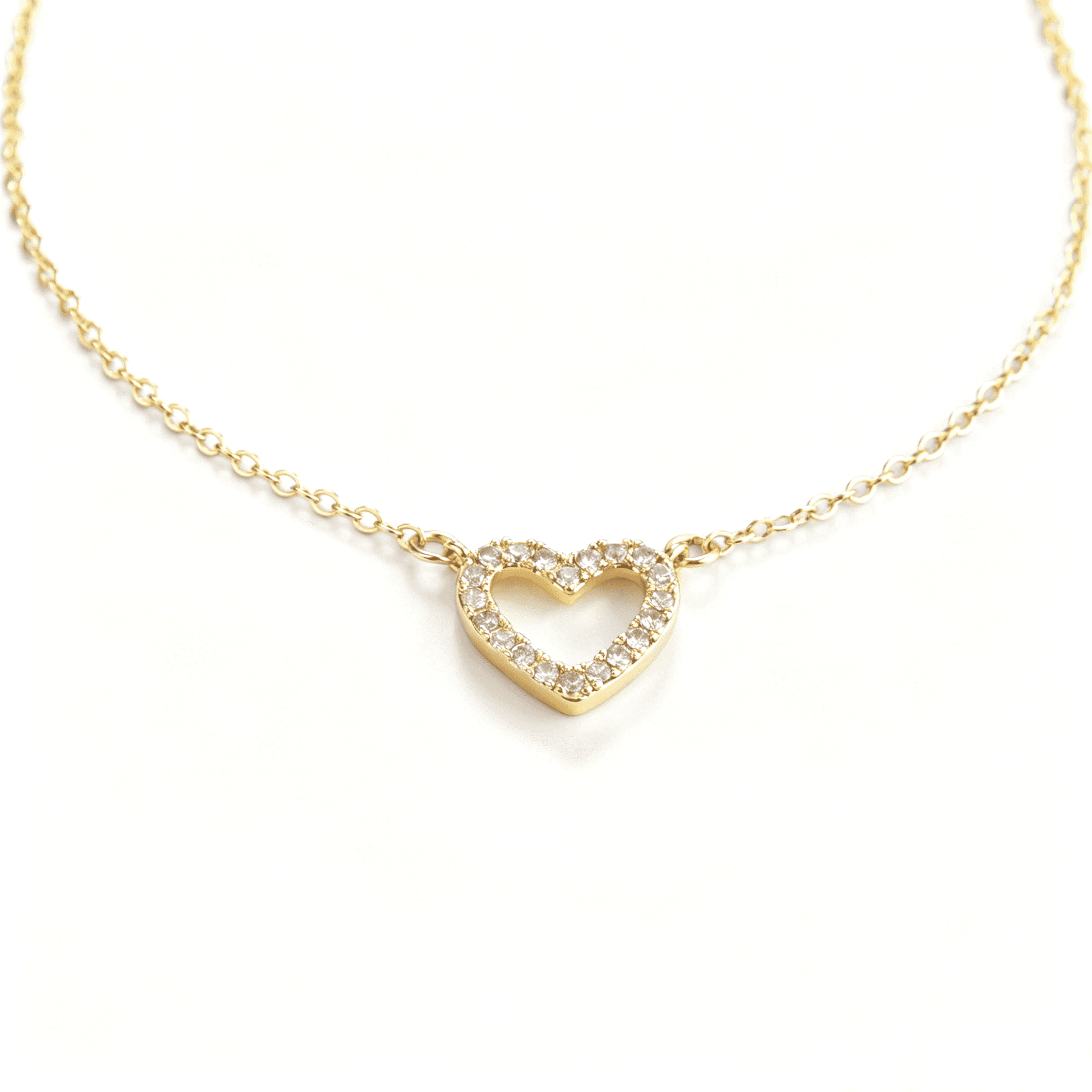 Close front view of a gold-tone cubic zirconia heart pendant