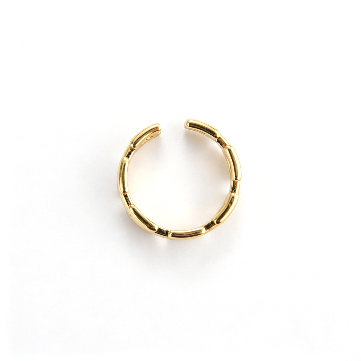 Geometric link cuff ring shown from an angled three-quarter view